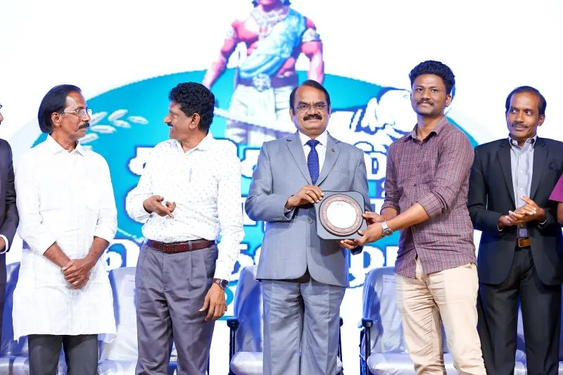 The Karikal Chola Award being presented on stage